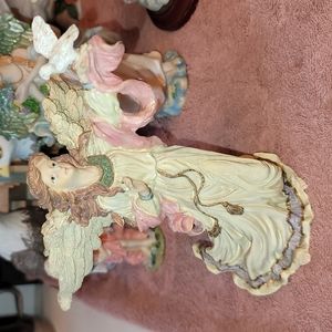 Angel with dove figurine